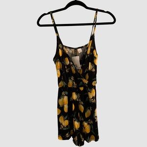 NWT Black romper with lemon print